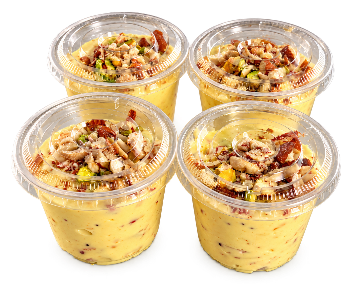 Four cups of Rasoi Ghar shrikhand topped with chopped nuts